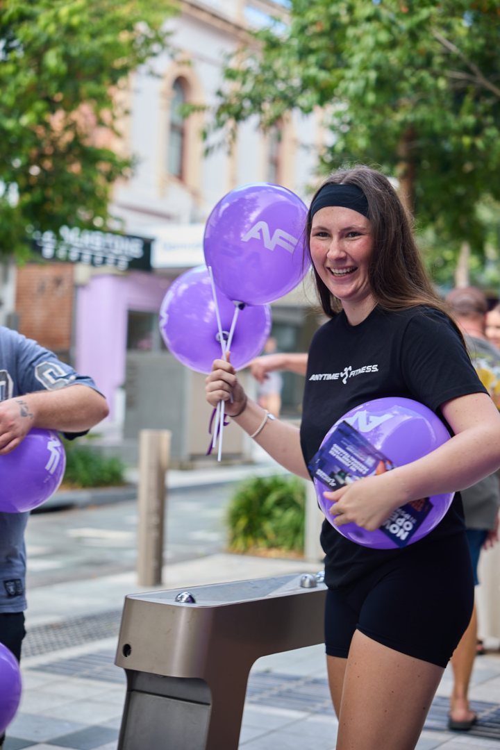 Anytime Fitness street activation with branded balloons, shot by Digi Agency