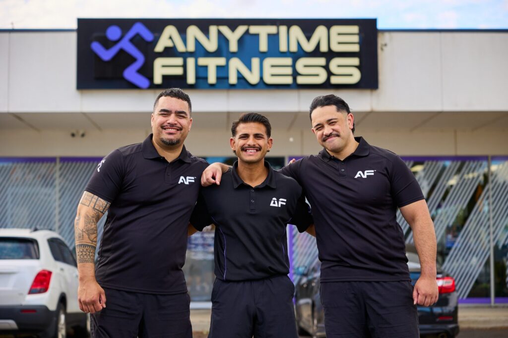 Watergardens team under the Anytime Fitness sign