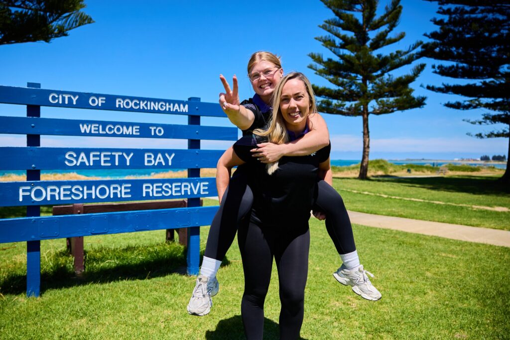 Safety Bay team at the foreshore reserve sign